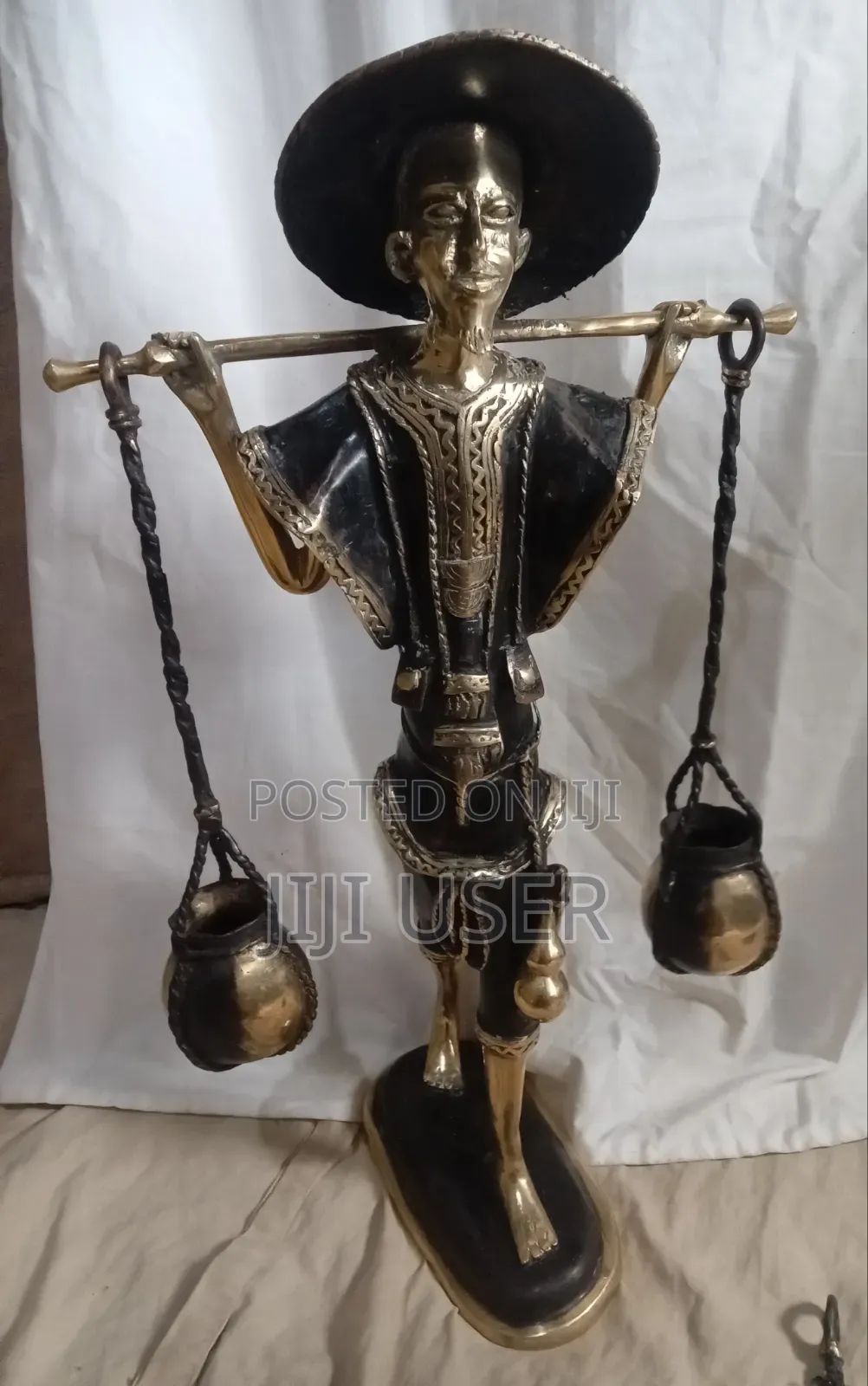 West African Water Carrier. FIgurine From Burkina Faso.