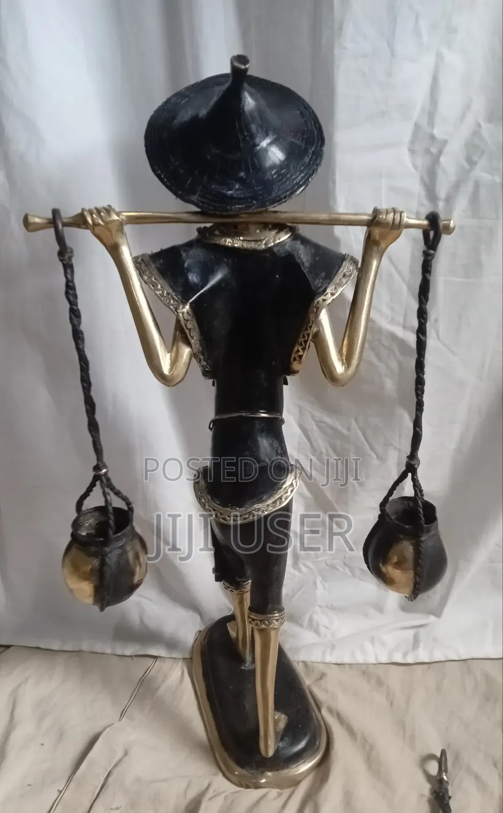 West African Water Carrier. FIgurine From Burkina Faso.