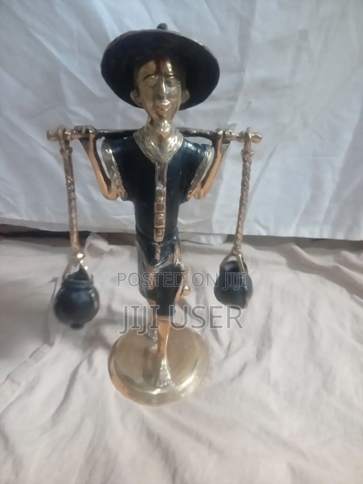 West African Water Carrier. FIgurine From Burkina Faso.