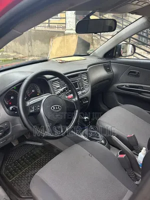 Kia Rio SX 4dr Sedan (1.6L 4cyl 4A) 2010 Red