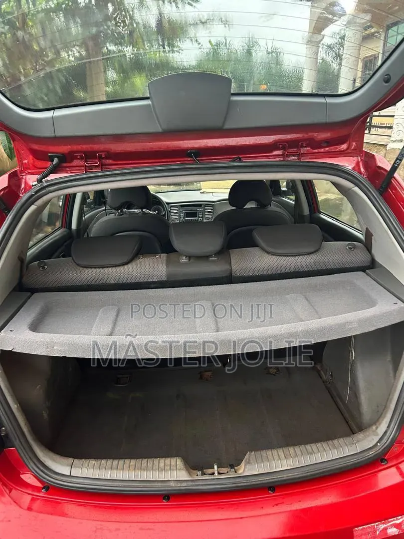 Kia Rio SX 4dr Sedan (1.6L 4cyl 4A) 2010 Red