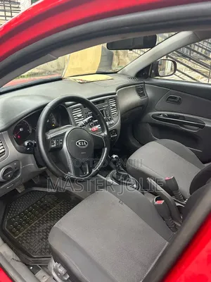 Kia Rio SX 4dr Sedan (1.6L 4cyl 4A) 2010 Red