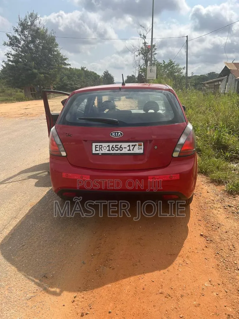 Kia Rio SX 4dr Sedan (1.6L 4cyl 4A) 2010 Red