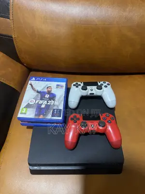 PS 4 Slim Console With 3 CDs 2 Controllers