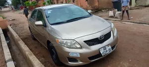 Toyota Corolla LE 4dr Sedan (1.8L 4cyl 4A) 2010 Gold
