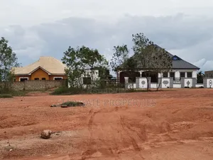 4 Plots ( 1 Acre Land) 3rd Plots Main Highway Aputuogya