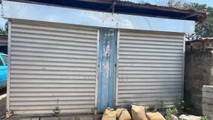 Container With Newly Installed Roller Shutters