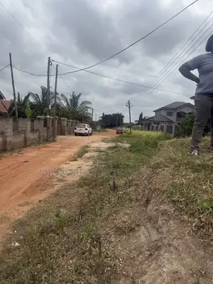 140x70ft Land for Sale at Afienya