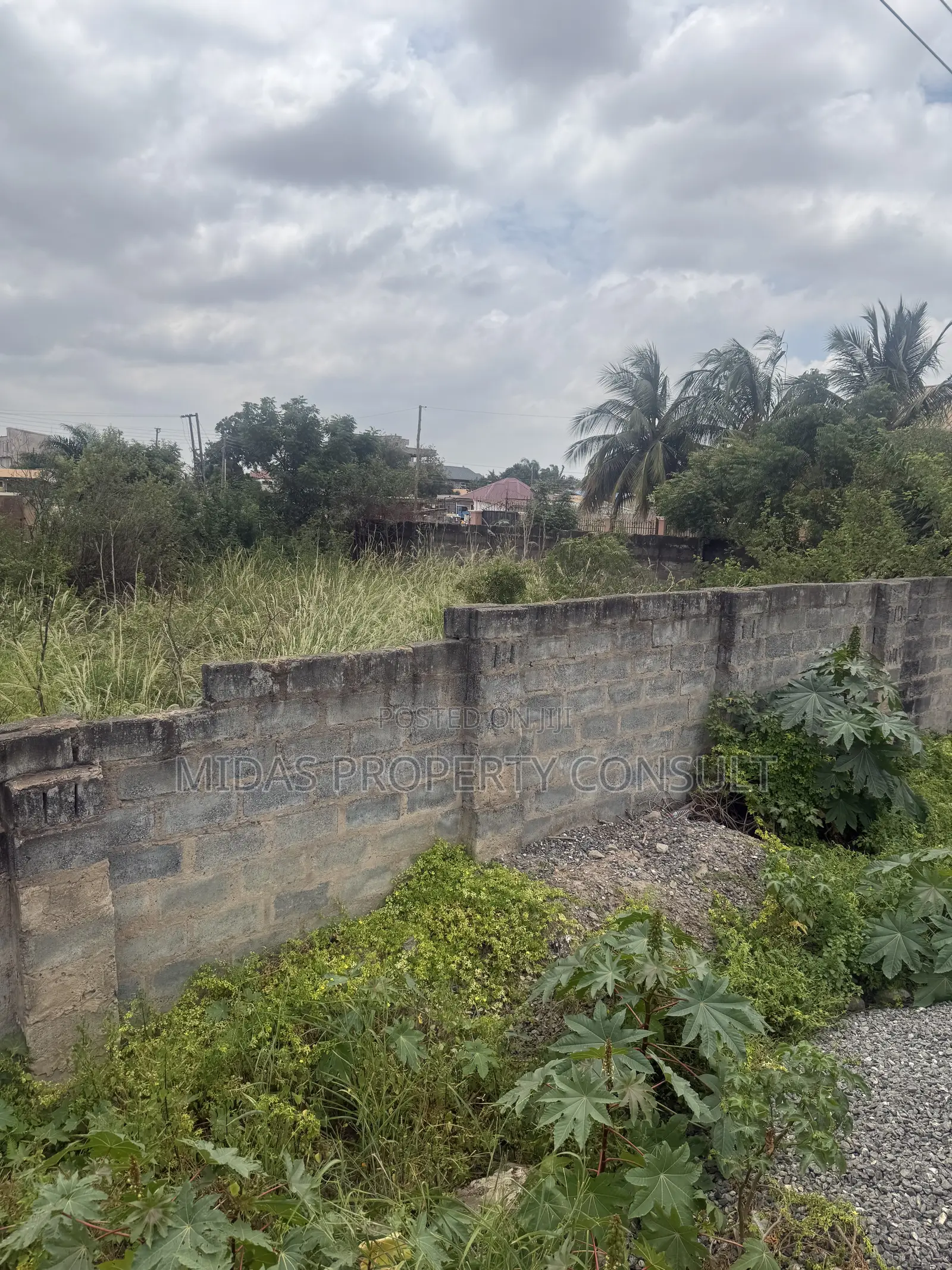 140x70ft Land for Sale at Afienya