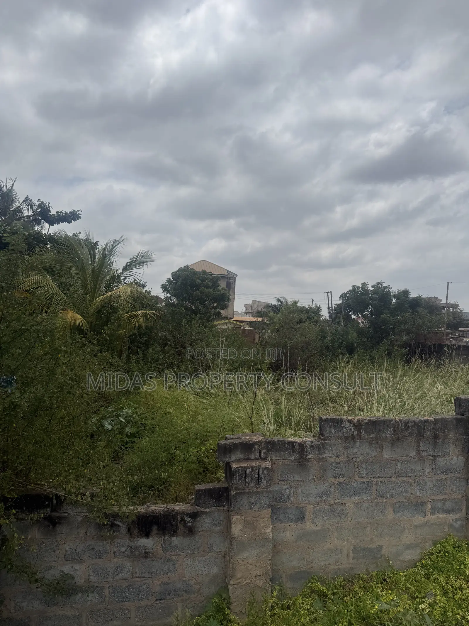 140x70ft Land for Sale at Afienya