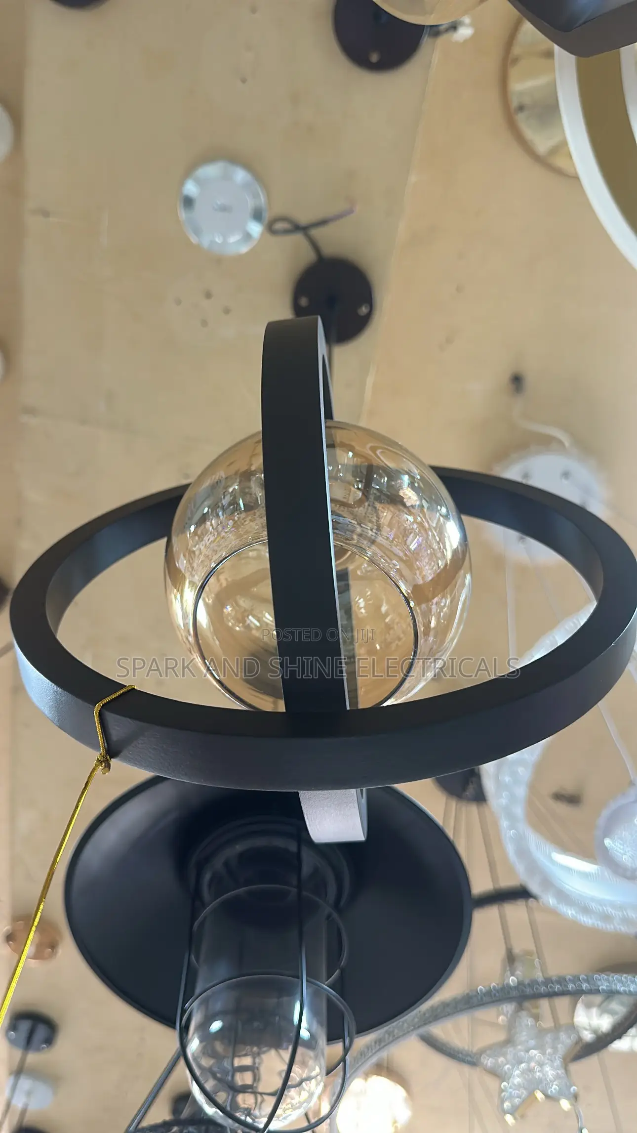 Modern Black Orbit Amber Glass Pendant Light.