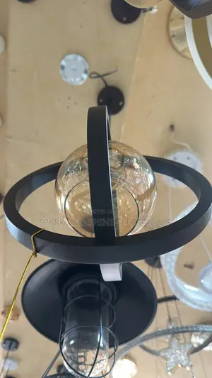 Modern Black Orbit Amber Glass Pendant Light.