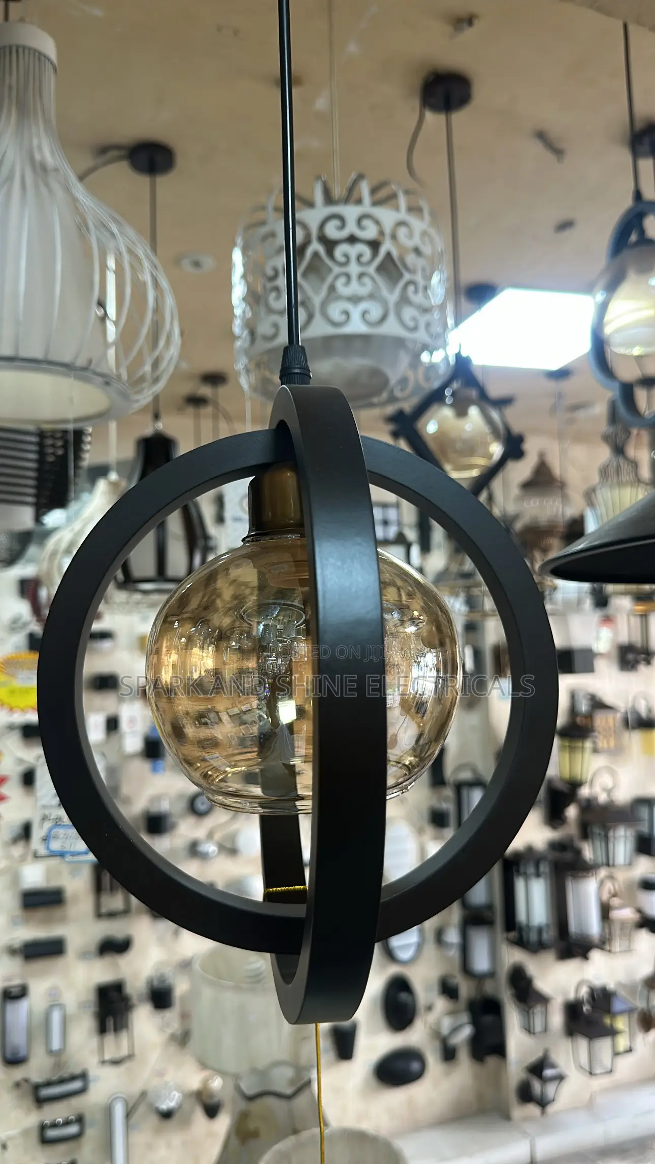 Modern Black Orbit Amber Glass Pendant Light.
