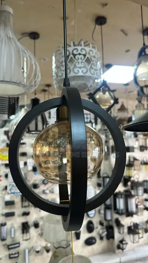 Modern Black Orbit Amber Glass Pendant Light.