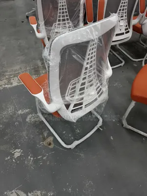 Ergonomic Mesh Visitor Chair With Sled Base and Flip Armrests