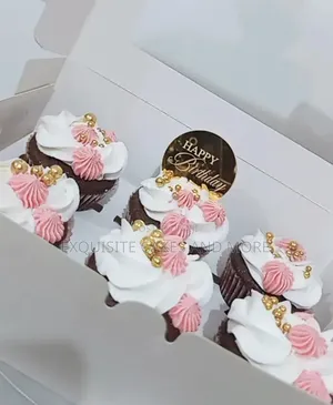 Six Red Velvet Cupcakes With Whipped Cream