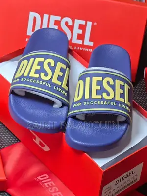 A Pair of Blue Diesel SA-Mayemi CC Slide Sandals