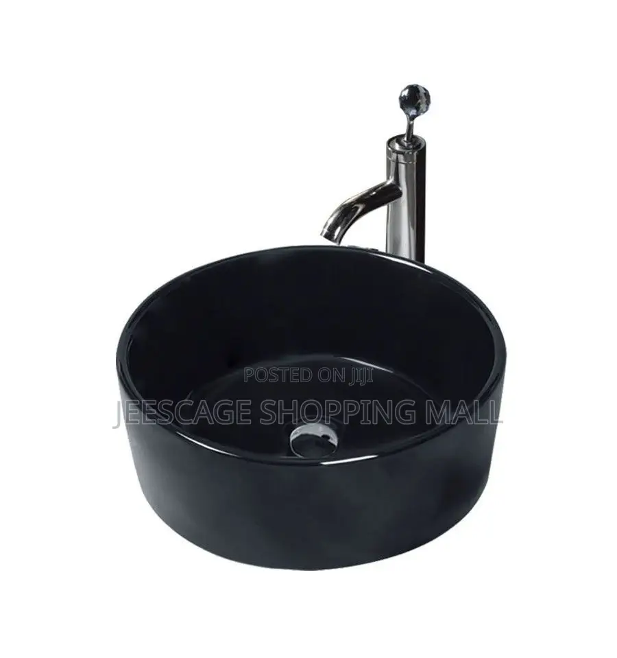Modern Black Ceramic Vessel Sink With Gold Faucet and Drain Combo