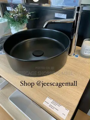 Modern Black Ceramic Vessel Sink With Gold Faucet and Drain Combo