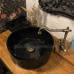 Modern Black Ceramic Vessel Sink With Gold Faucet and Drain Combo