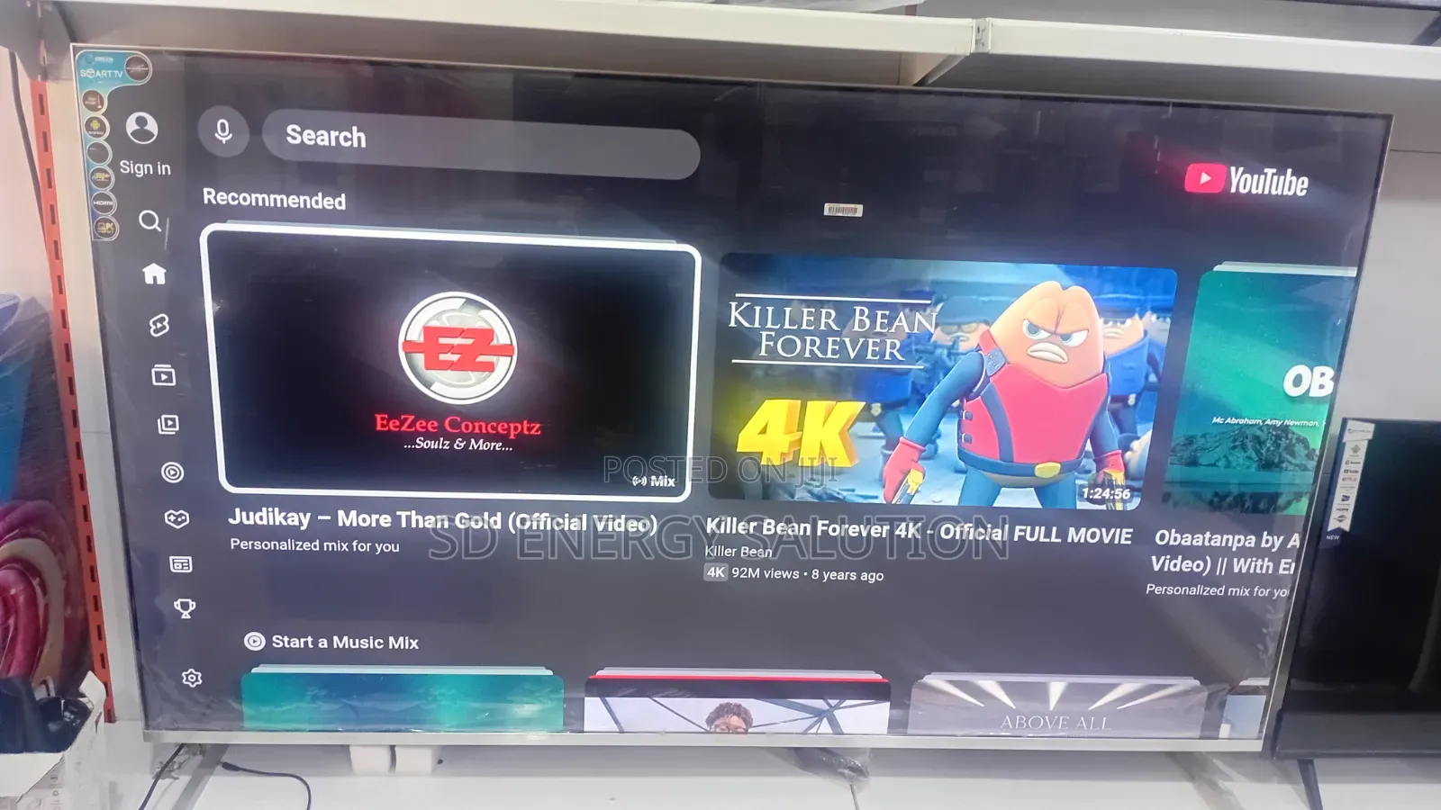 Green 75-Inch Smart TV – Immersive Viewing Experience