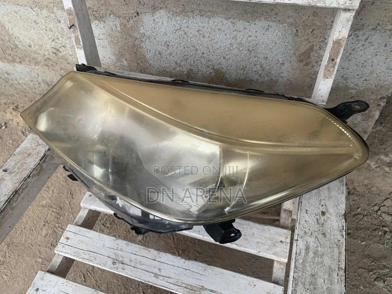 Original 2012 Toyota Vitz HeadLights (Right )