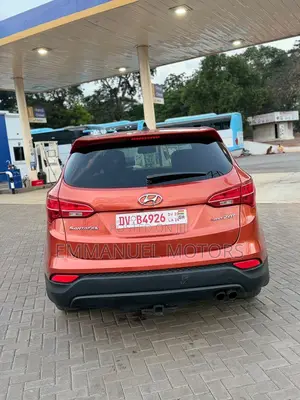 Hyundai Santa Fe Limited 4dr SUV AWD (3.3L 6cyl 6A) 2015 Orange