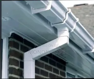 White PVC Rain Gutter and Black Accessories