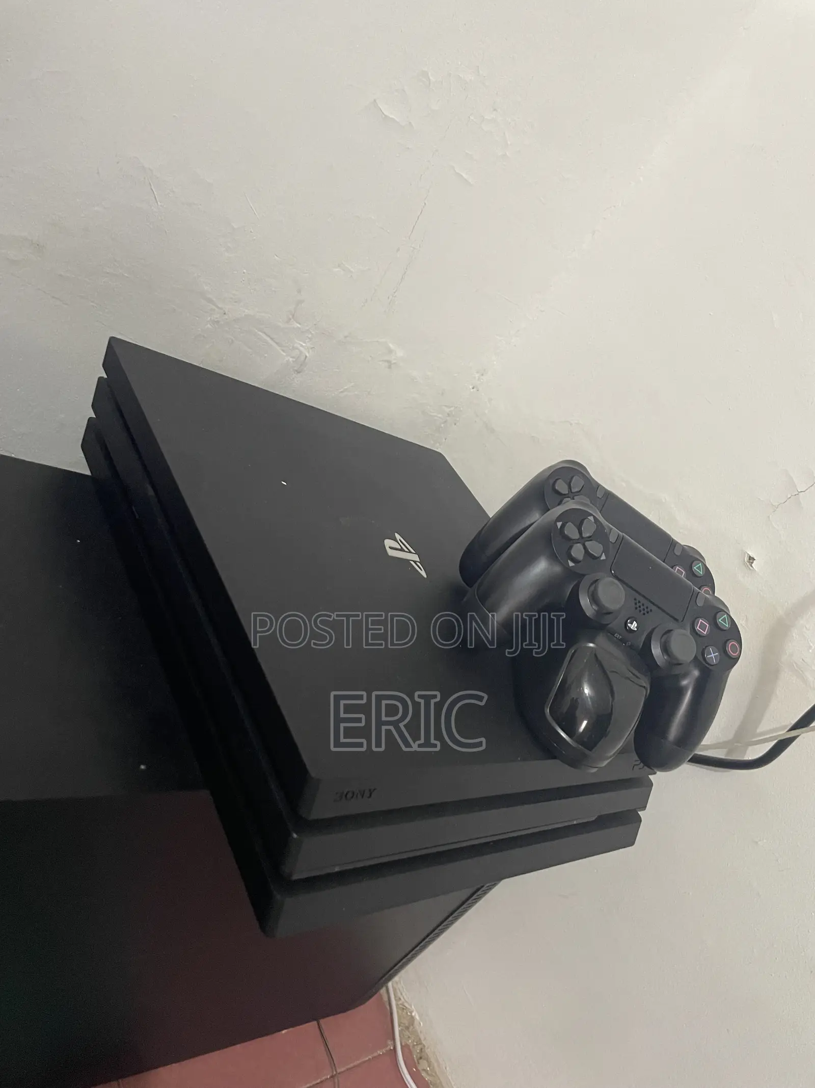 PS 4 Pro With All the Cables 2 Pads With a Charging Pot