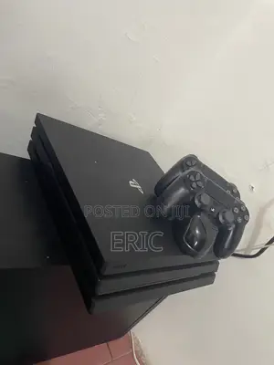 PS 4 Pro With All the Cables 2 Pads With a Charging Pot