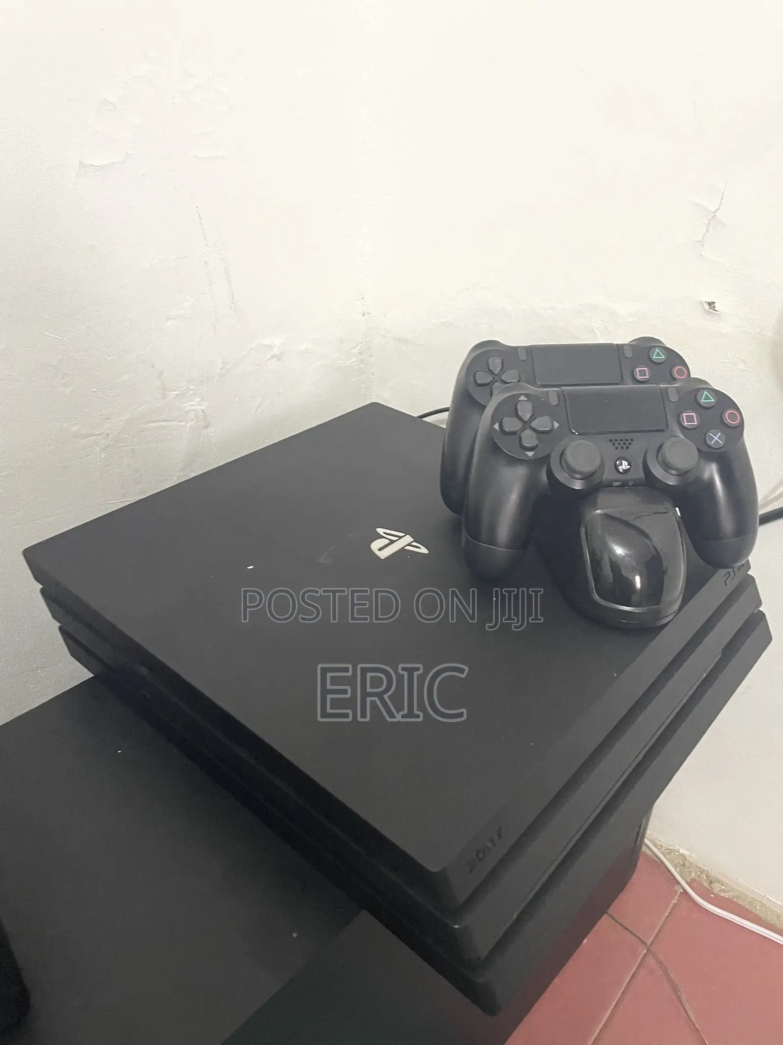 PS 4 Pro With All the Cables 2 Pads With a Charging Pot