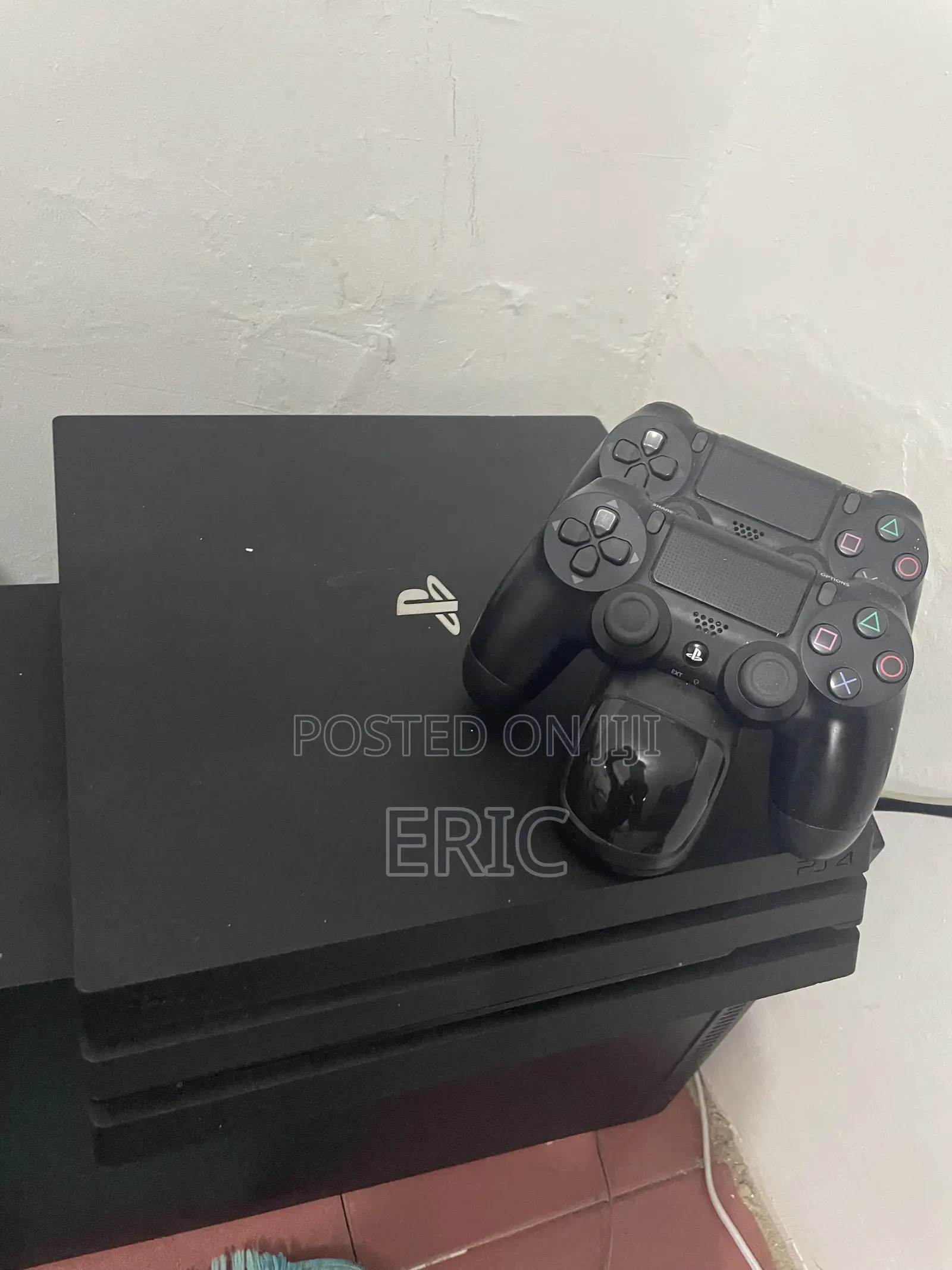 PS 4 Pro With All the Cables 2 Pads With a Charging Pot