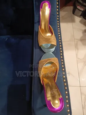 Pair of High - Heeled Mule Sandals