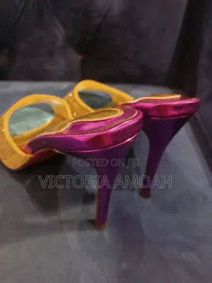 Pair of High - Heeled Mule Sandals