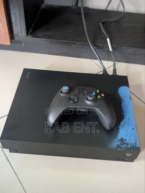 Xbox One X Console With Games and One Controller