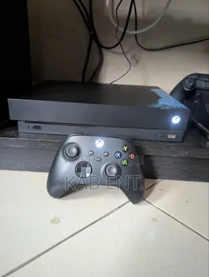 Xbox One X Console With Games and One Controller