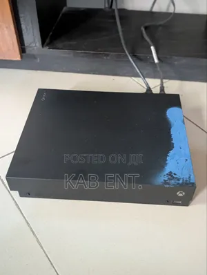 Xbox One X Console With Games and One Controller