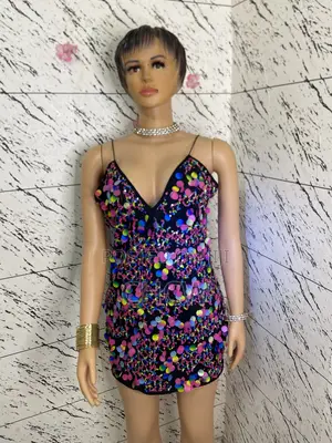A Matching Skirt and Top and a Flashy Mini Dress (A Package)