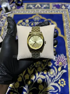 Nixon Gold-Tone Classic Watch – Timeless Luxury