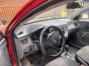 Kia Rio LX 4dr Sedan (1.6L 4cyl 4A) 2010 Red