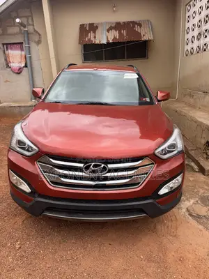 Hyundai Santa Fe Limited 4dr SUV AWD (3.3L 6cyl 6A) 2015 Orange