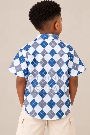 Blue Argyle Shirt. 6-7Years