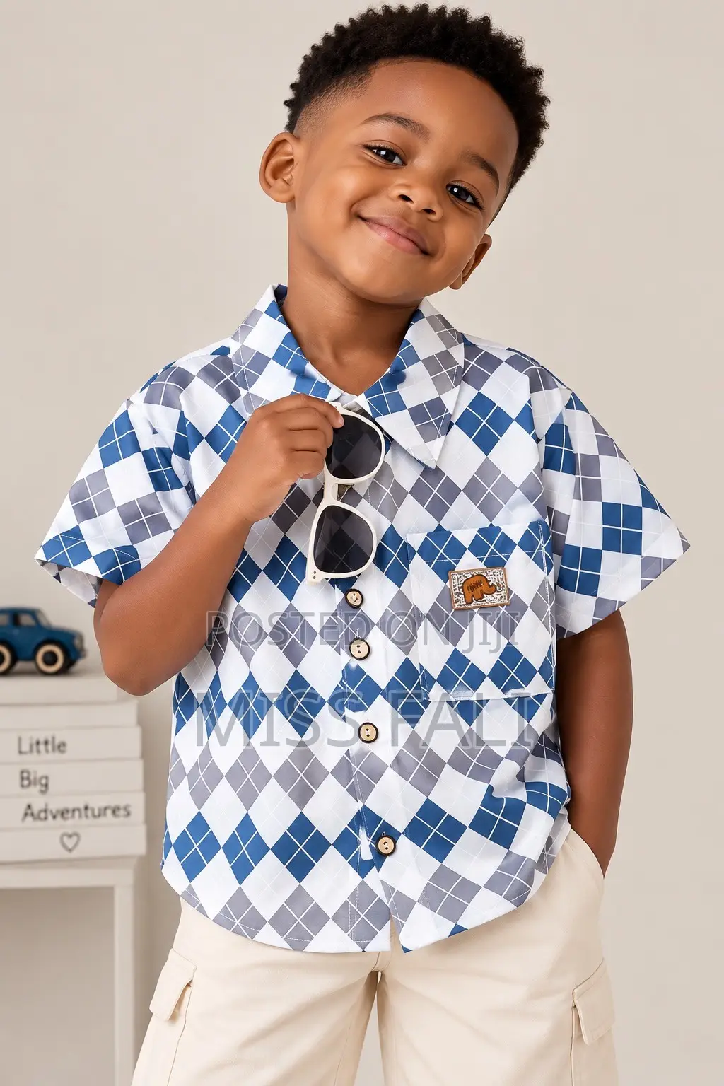 Blue Argyle Shirt. 6-7Years