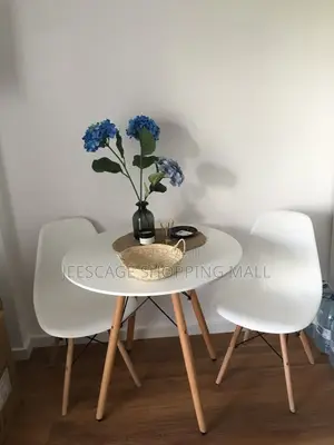 Mid-Century Modern Round Dining Table With Wood Legs