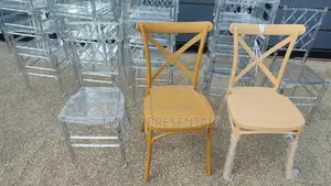 Acrylic / Crystal / Ghost Chairs and Cross-Back Chairs Are for Sale