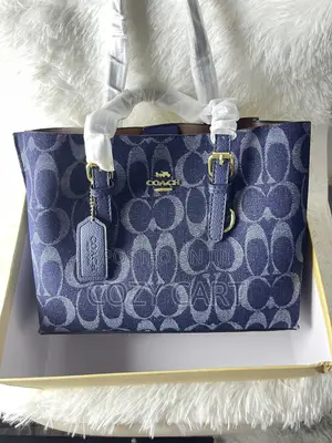 Coach Bag With Teddy Bear Charm