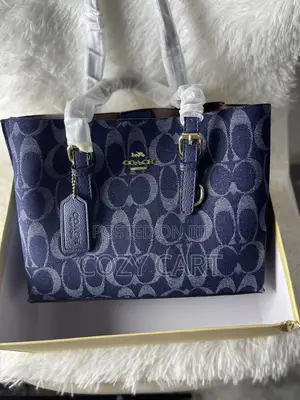 Coach Bag With Teddy Bear Charm