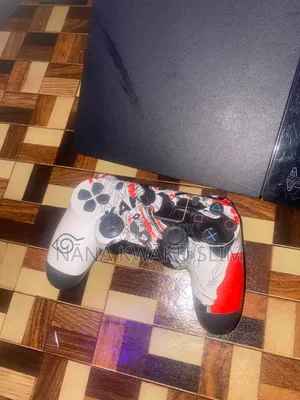 Slightly Used Play Station 4 With One Game Controller