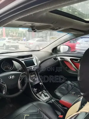 Hyundai Elantra SE Coupe FWD (1.8L 4cyl 6A) 2013 Brown