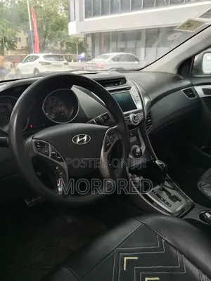 Hyundai Elantra SE Coupe FWD (1.8L 4cyl 6A) 2013 Brown
